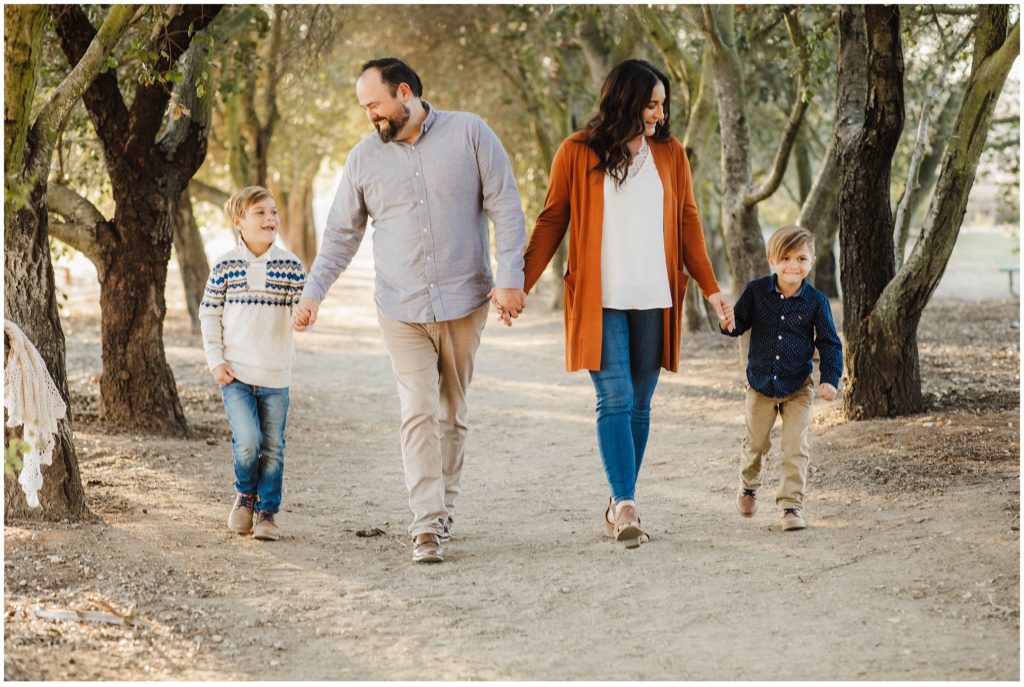 image of family walking during photoshoot in San Diego