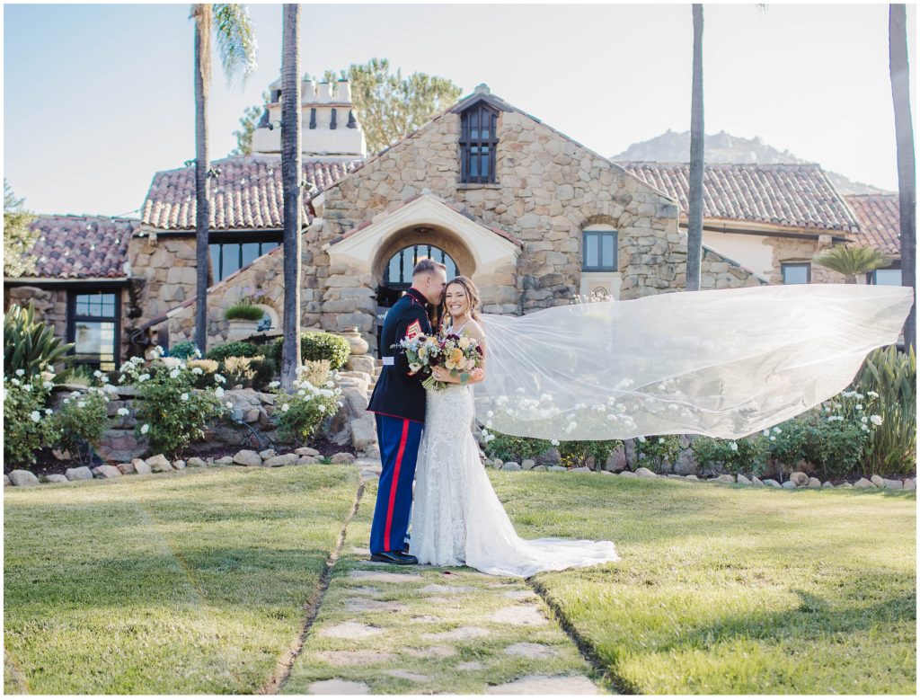 Image of bride and groom in front of Mt. Woodson Castle